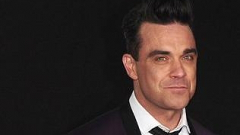 Ouça "Little Green Apples", dueto de Robbie Williams e Kelly Clarkson